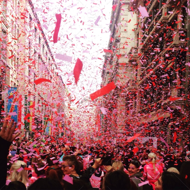 stock-photo-pink-women-running-concert-music-festival-confetti-mardi-gras-sparkles-glitter-02c6921e-b152-4c12-806e-f91a6f3ecce3